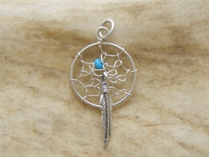 Pendentif plume en  or