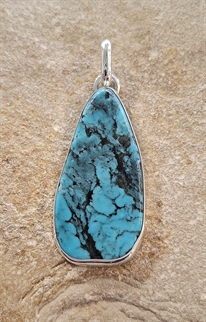 Pendentif patte d'ours